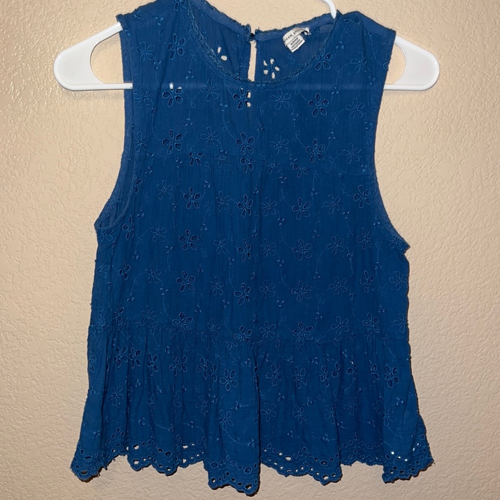 American Eagle Peplum tank with flower cut outs